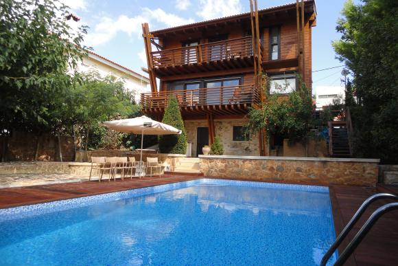 Dioni Log House